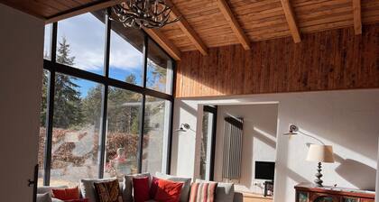 Luxury 5 bedroom, 3 bathroom hillside Chalet with views of Italian border.