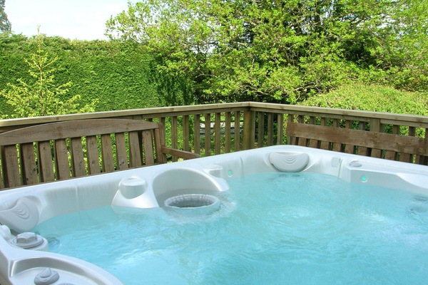 New 7 seater hot tub installed on new decking area.