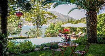 Superb waterfront villa with private pool, jetty, motorboat included and sauna