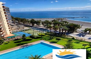 A resort with a swimming pool, beach, and ocean view. - LAS GONDOLAS BEACH APARTMENT II. ALOJAMIENTOS VISTAMAR (Almuñecar)