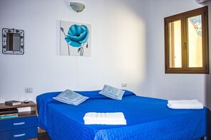 2 habitaciones y tabla de planchar con plancha 