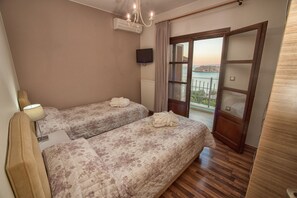 3 habitaciones, tabla de planchar con plancha y acceso a internet