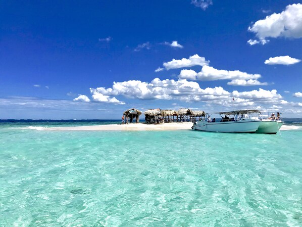 On the beach, sun loungers, beach towels