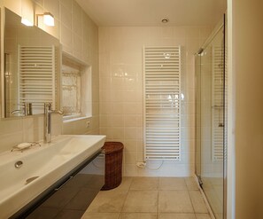 Combined shower/tub, hair dryer, towels, toilet paper