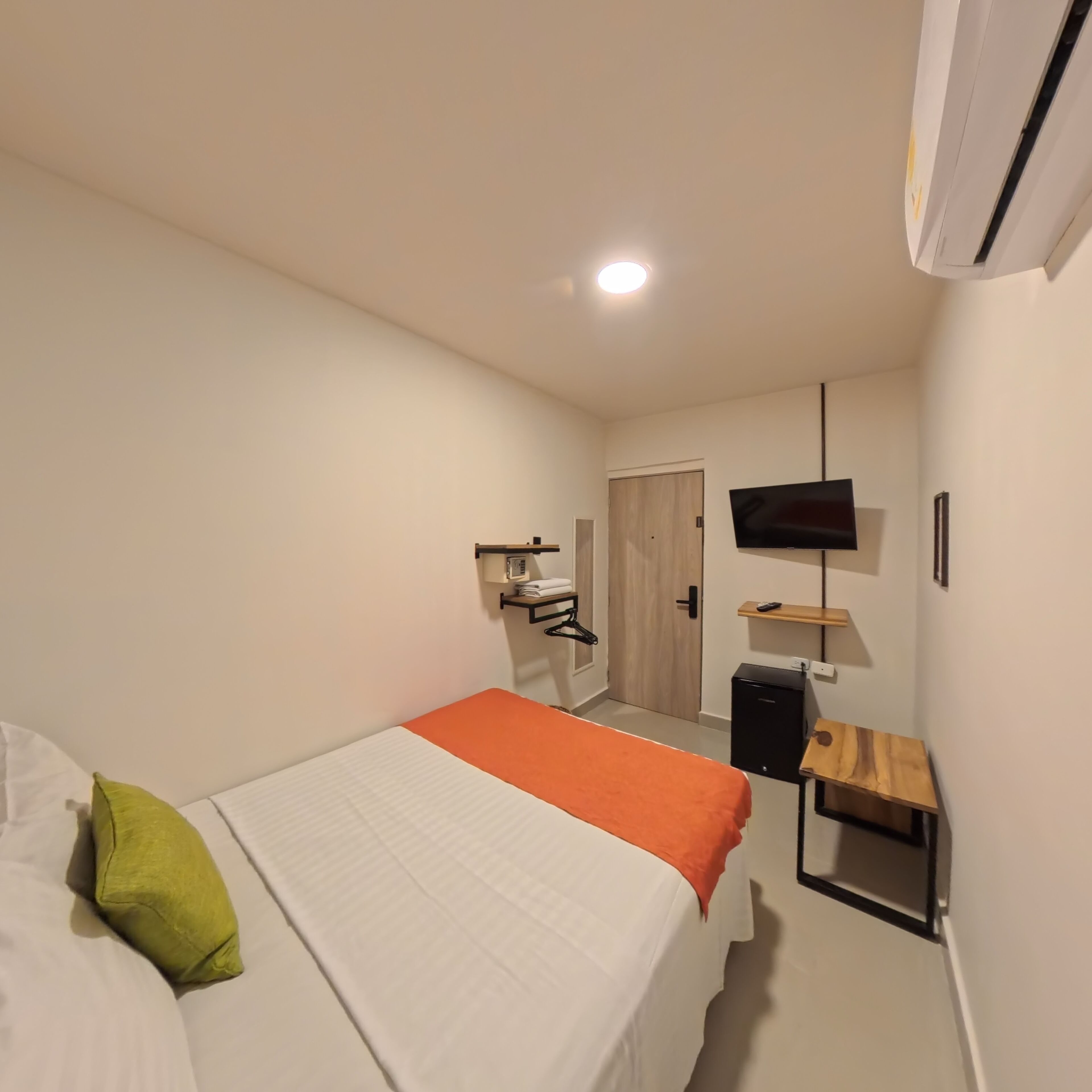 Economy Room | In-room safe, iron/ironing board, free WiFi, bed sheets