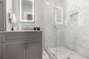 Combined shower/tub, hair dryer, towels, soap