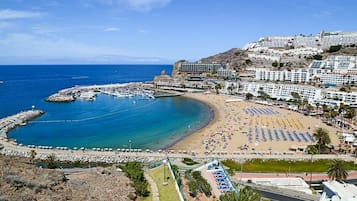 On the beach, beach towels