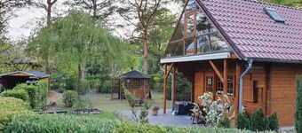 Tømmerhytte Canow med båt - tømmerhytte Canow