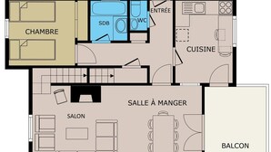 Un hôtel proposant des chambres dotées d’un salon, d’une cuisine, d’un coin repas, d’une salle de bain et d’un balcon.