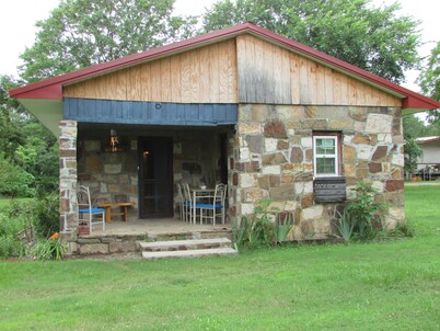 Restored rock house with hot tub and beautiful private deck.