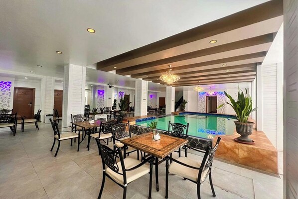 Breakfast, lunch, dinner served; Filipino cuisine, pool views