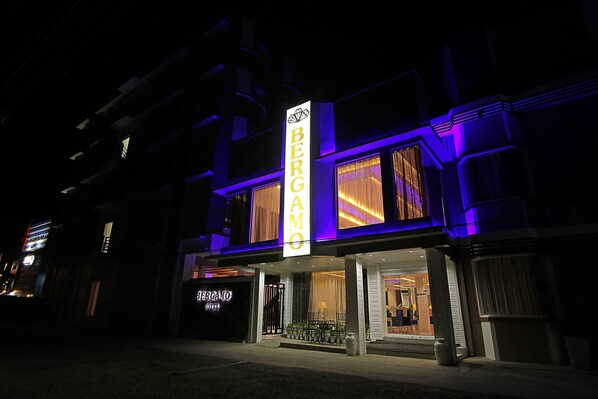 A building with a prominent vertical sign reading "BERGAMO." - Bergamo Hotel Lingayen (Lingayen)