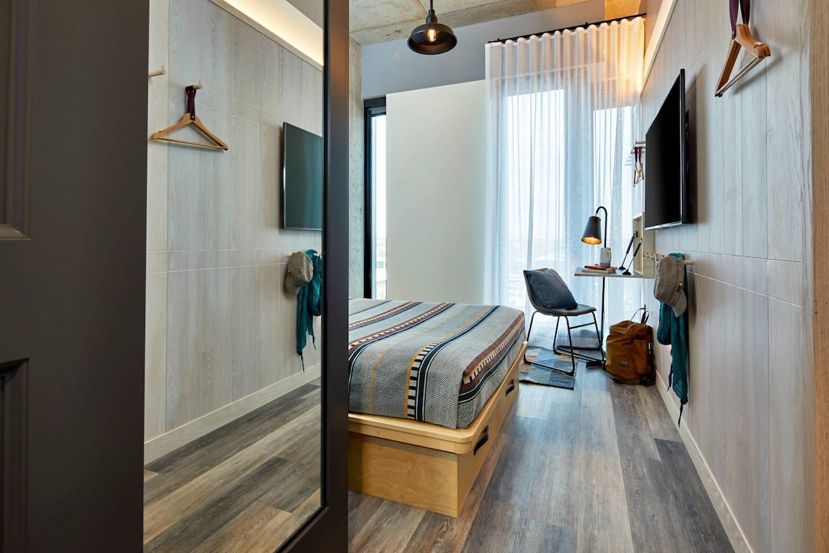 Pillow-top beds, desk, laptop workspace, blackout curtains