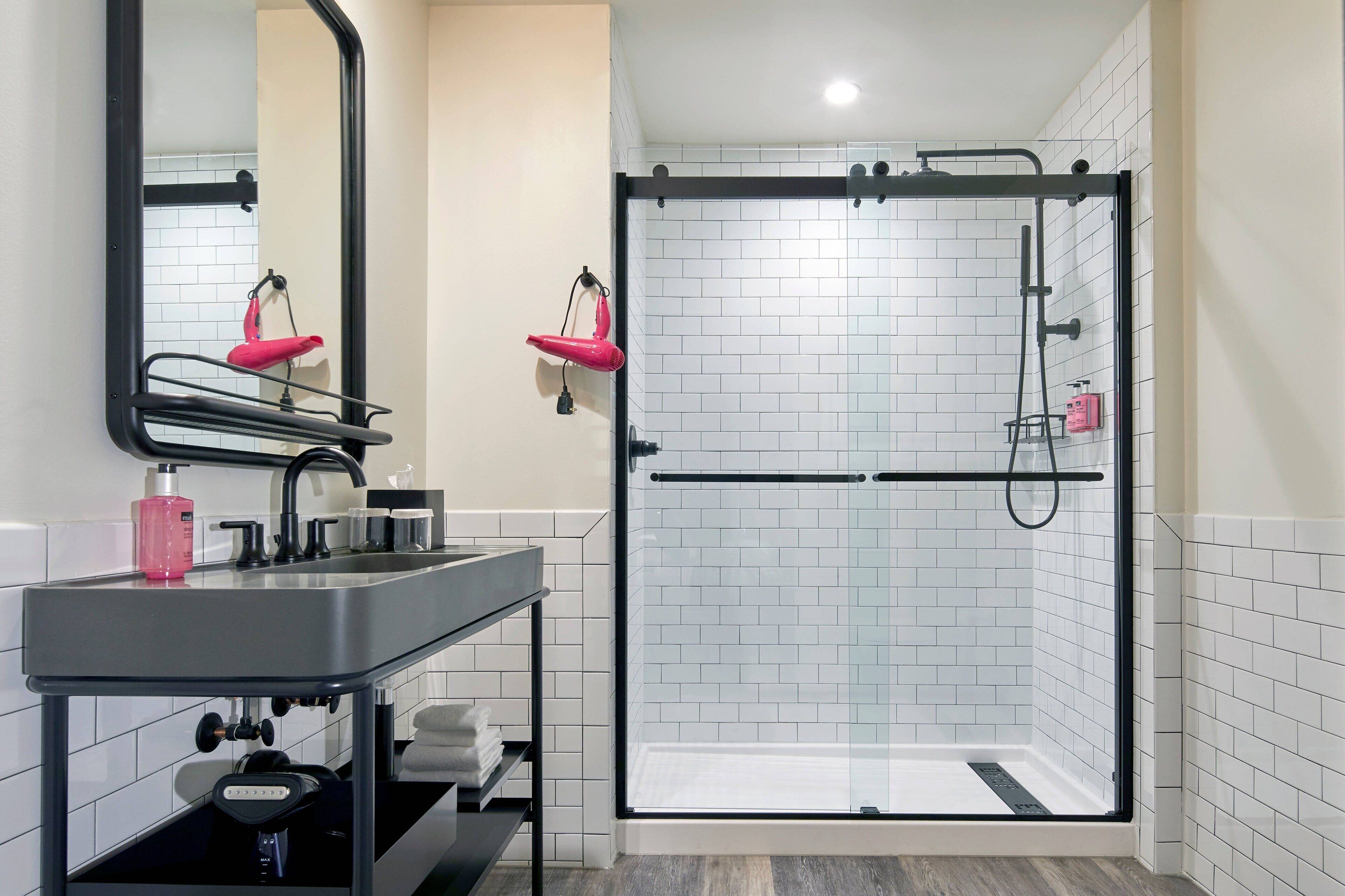 shower, designer toiletries, towels