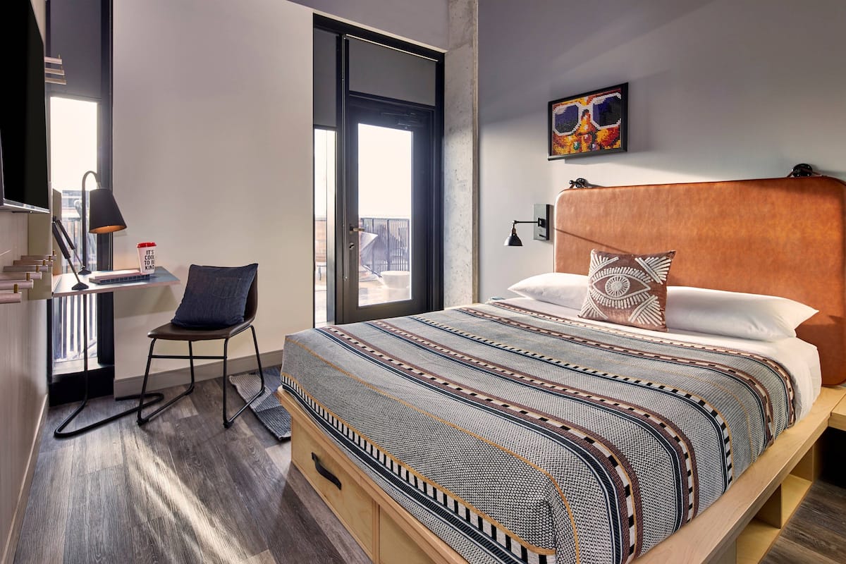 Pillow-top beds, desk, laptop workspace, blackout curtains