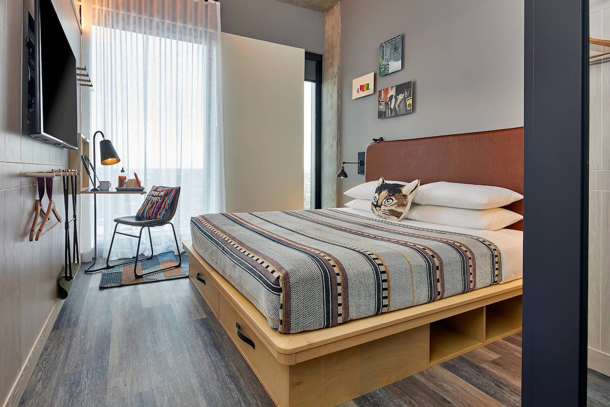 Pillow-top beds, desk, laptop workspace, blackout curtains