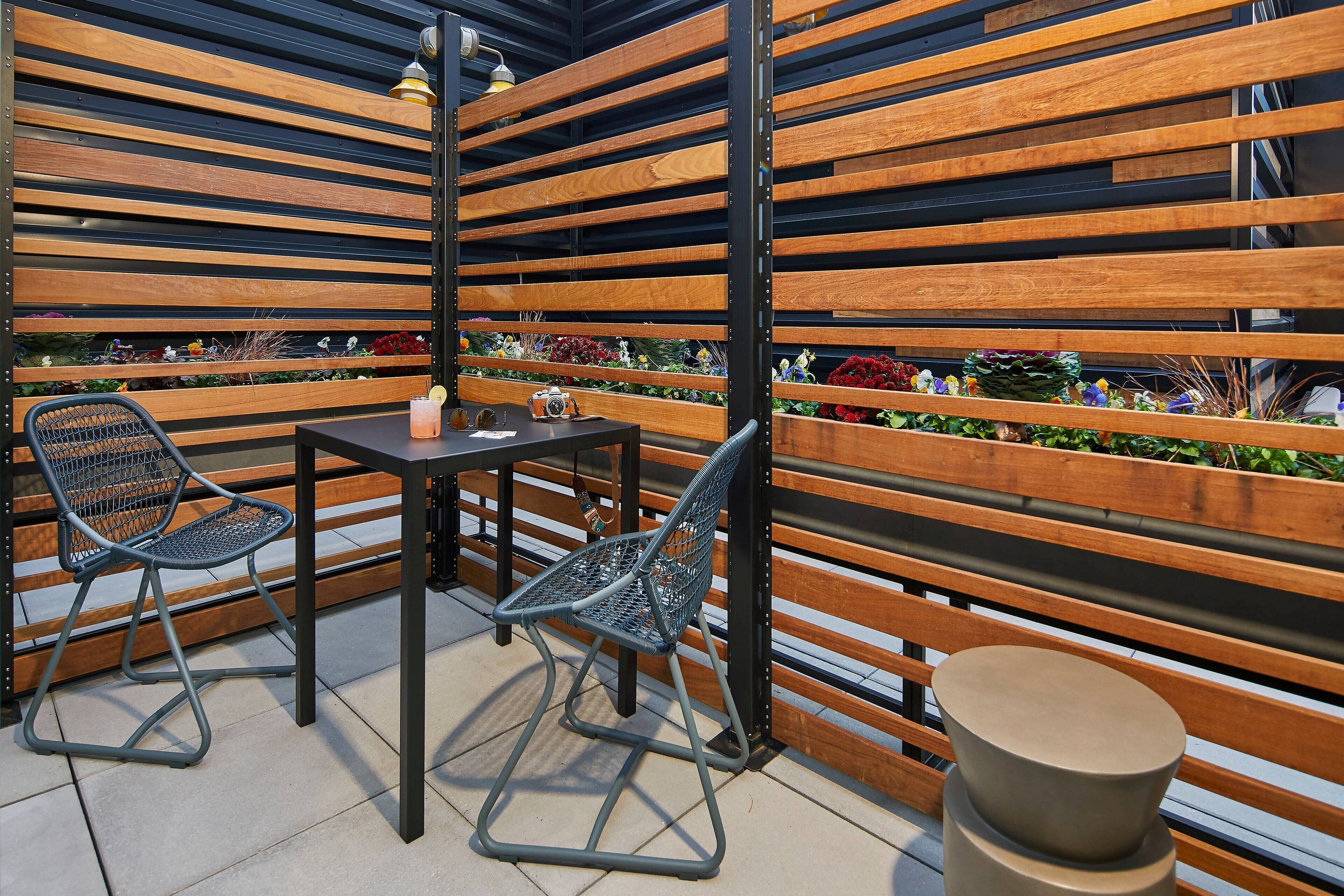 pillow-top beds, desk, laptop workspace, blackout curtains