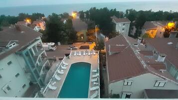 Seasonal outdoor pool, pool umbrellas, sun loungers