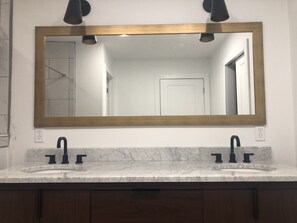 Bathtub, hair dryer, towels, soap