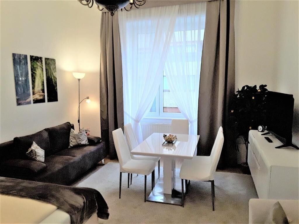 Apartamento, 2 habitaciones (17) | Zona de estar | Una televisión de pantalla plana