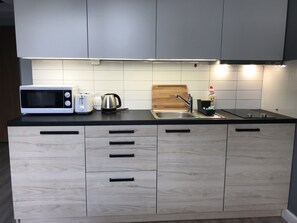 Fridge, microwave, electric kettle, toaster