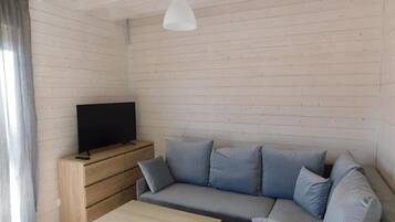 40-inch flat-screen TV with cable channels, LCD TV