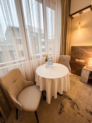 Standard Double Room | Living area | 32-inch LCD TV with satellite channels, TV