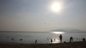 Beach nearby, white sand, beach cabanas, sun loungers