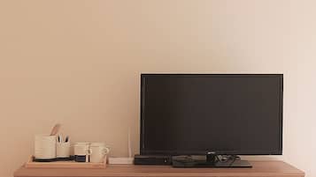 Standard Quadruple Room, Multiple Beds, Non Smoking | Television