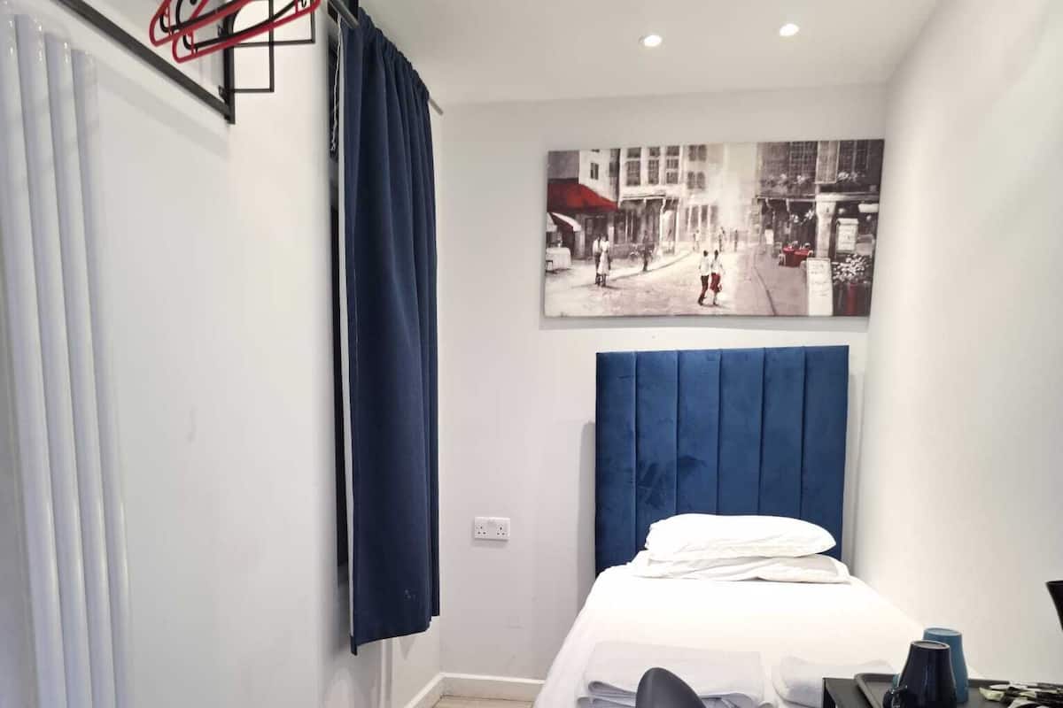 1 bedroom, desk, blackout curtains, iron/ironing board