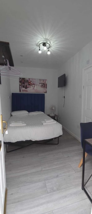 Small Double Room | 1 bedroom, desk, blackout drapes, iron/ironing board
