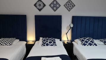 Comfort Quadruple Room | 1 bedroom, desk, blackout curtains, iron/ironing board
