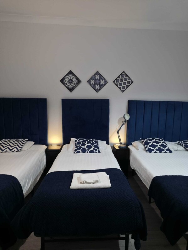 Comfort Quadruple Room | Desk, blackout drapes, iron/ironing board, free WiFi