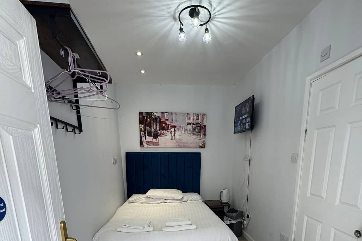 Small Double Room | 1 bedroom, desk, blackout curtains, iron/ironing board