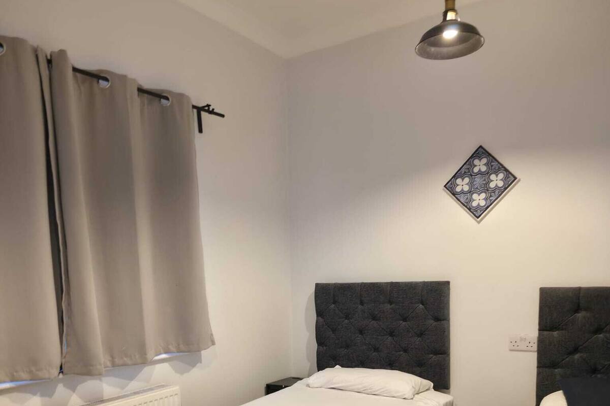 Desk, blackout drapes, iron/ironing board (on request), WiFi (free)