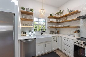 Fridge, microwave, oven, stovetop - Island Oasis: Ground level canal front pool home (Anna Maria)