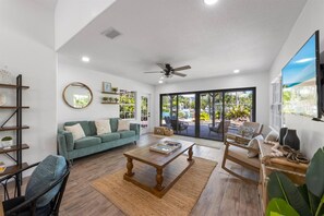 TV, DVD player, books, music library - Island Oasis: Ground level canal front pool home (Anna Maria)