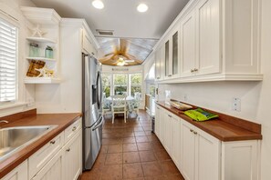 Fridge, microwave, oven, stovetop - Sharks Eye- Original island cottage on historic Pine Ave. (Anna Maria)