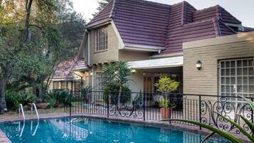 Outdoor pool, pool umbrellas, pool loungers