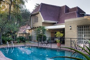 Outdoor pool, pool umbrellas, pool loungers