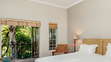 Executive Room | Pillowtop beds, minibar, in-room safe, individually decorated