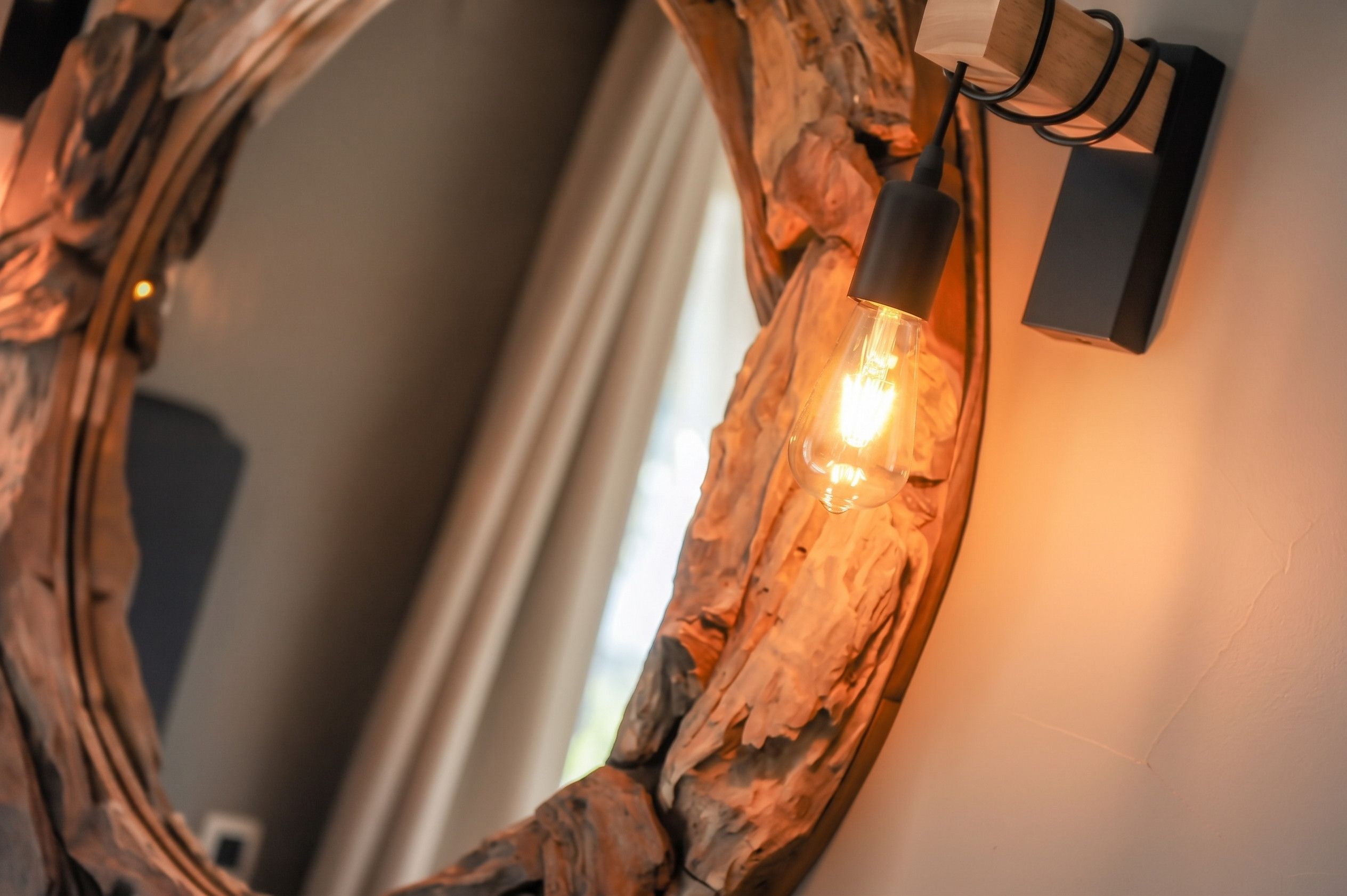A light fixture integrated into a wooden wall decor.