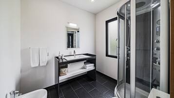 Shower, free toiletries, hair dryer, towels