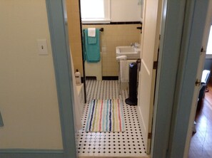 Combined shower/tub, hair dryer, towels, soap