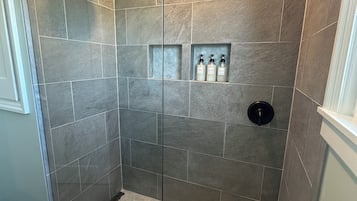 Bathtub, hair dryer, towels, soap