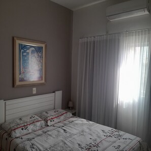 2 habitaciones, tabla de planchar con plancha, wifi y ropa de cama 