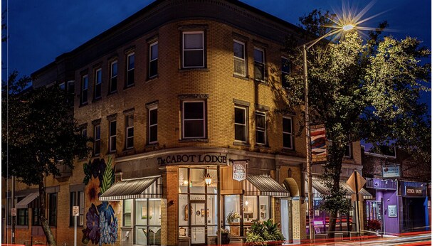 A brick building with a sign reading "The Cabot Lodge." - The Cabot Lodge (Beverly)