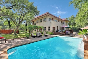 A two-story house with a swimming pool, outdoor furniture, and a well-maintained garden. - The Lancaster Manor B&B (Gainesville)