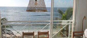 Beach apartment with 180° view of the Caribbean Sea and swimming pools