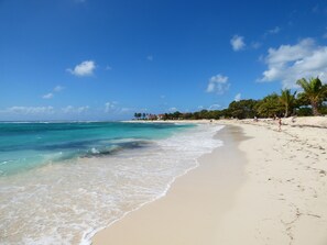 On the beach, sun loungers, beach towels